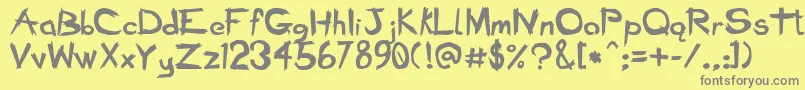 BadSeedBold-fontti – harmaat kirjasimet keltaisella taustalla