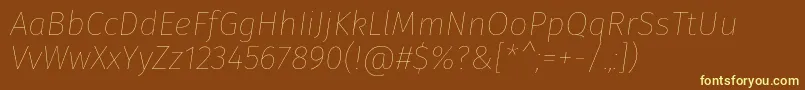 Fonte FirasansHairitalic – fontes amarelas em um fundo marrom