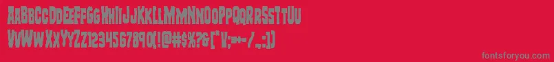 Freakfindercond-fontti – harmaat kirjasimet punaisella taustalla