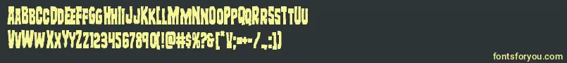 フォントFreakfindercond – 黒い背景に黄色の文字
