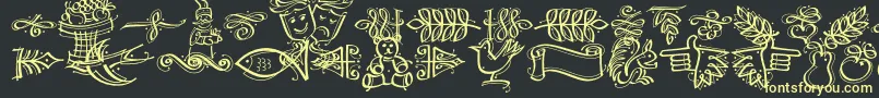 フォントDfcalligraphicornament – 黒い背景に黄色の文字