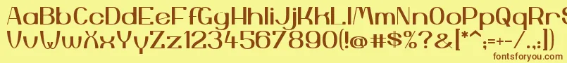 フォントYiggivooUc – 茶色の文字が黄色の背景にあります。