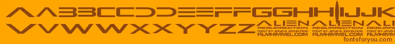 AlienResurrection Font – Brown Fonts on Orange Background