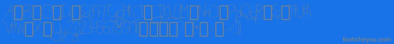 BellaKABetterPlaceAlts-fontti – harmaat kirjasimet sinisellä taustalla
