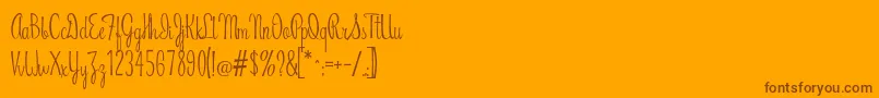 RiddleScript-Schriftart – Braune Schriften auf orangefarbenem Hintergrund