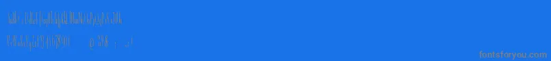 R.GigerTypeLight-fontti – harmaat kirjasimet sinisellä taustalla