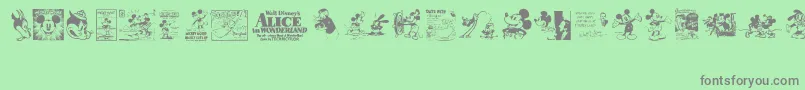 VintageClassicsDisney-Schriftart – Graue Schriften auf grünem Hintergrund