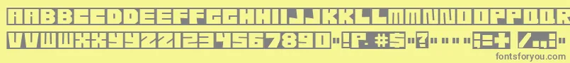 Etcher04-Schriftart – Graue Schriften auf gelbem Hintergrund