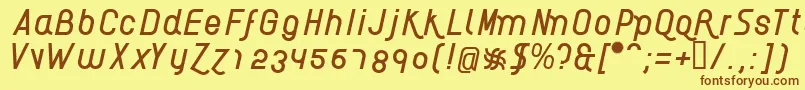 フォントAikelsoI – 茶色の文字が黄色の背景にあります。