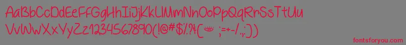 BehindBlueEyesOtf Font – Red Fonts on Gray Background