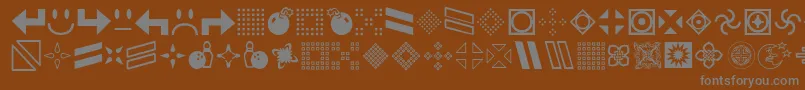 Gembats2-Schriftart – Graue Schriften auf braunem Hintergrund