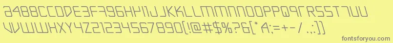 Escapeartistleft Font – Gray Fonts on Yellow Background