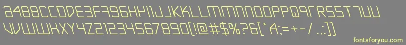 Escapeartistleft-Schriftart – Gelbe Schriften auf grauem Hintergrund