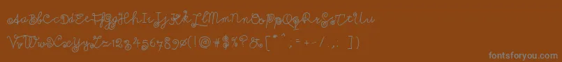 Weitere Informationen zur Milkmoustachio-Schriftart Milkmoustachio-Schriftart – Graue Schriften auf braunem Hintergrund