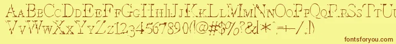 Intesc Font – Brown Fonts on Yellow Background