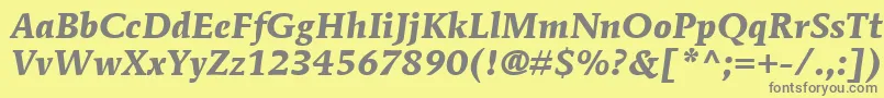 Czcionka ItcMendozaRomanLtBoldItalic – szare czcionki na żółtym tle