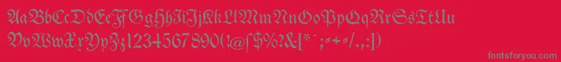 TheuerdankFraktur-Schriftart – Graue Schriften auf rotem Hintergrund