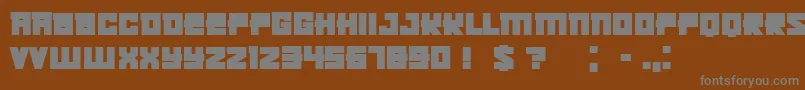 KachushaBold-fontti – harmaat kirjasimet ruskealla taustalla