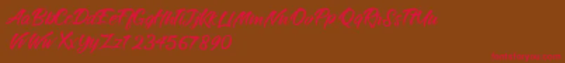 RougeMaheiraVintagePersonalUse Font – Red Fonts on Brown Background