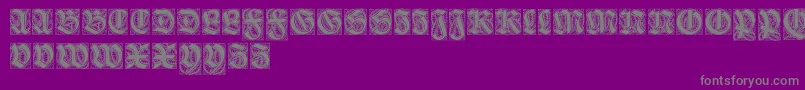 フォントEhmckeschwabacher – 紫の背景に灰色の文字