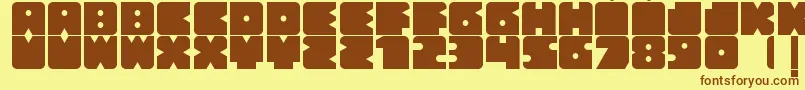 フォントBloquer – 茶色の文字が黄色の背景にあります。
