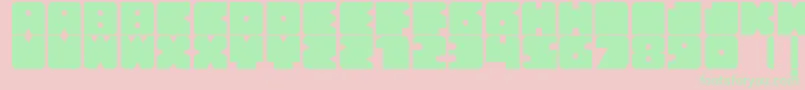 フォントBloquer – ピンクの背景に緑の文字