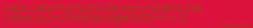 DeLuxeLightCondensed Font – Brown Fonts on Red Background