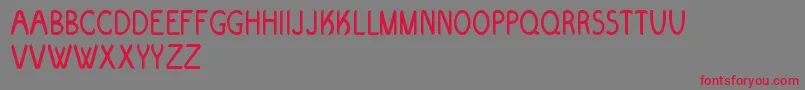 Evolve Font – Red Fonts on Gray Background