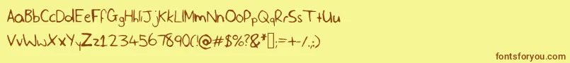 フォントSlfHandwriting – 茶色の文字が黄色の背景にあります。