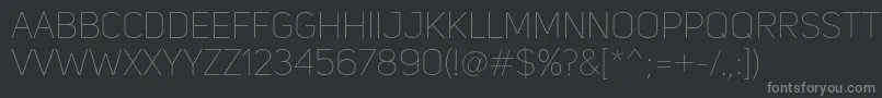 UniSansThin-fontti – harmaat kirjasimet mustalla taustalla