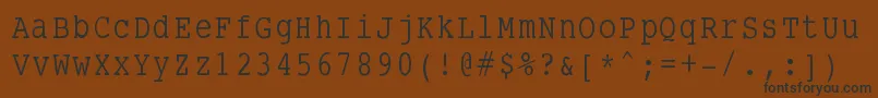 Smalltypewriting Font – Black Fonts on Brown Background