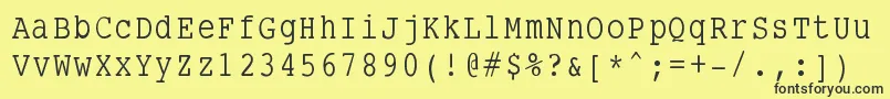 Smalltypewriting-fontti – mustat fontit keltaisella taustalla