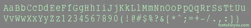 Fonte Smalltypewriting – fontes verdes em um fundo cinza
