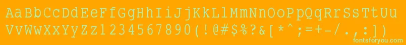 Smalltypewriting-fontti – vihreät fontit oranssilla taustalla
