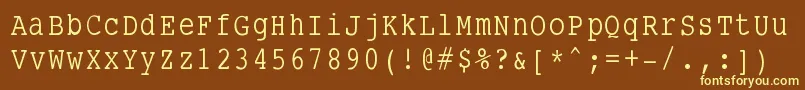 Smalltypewriting Font – Yellow Fonts on Brown Background