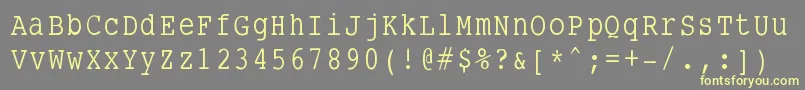 Smalltypewriting Font – Yellow Fonts on Gray Background