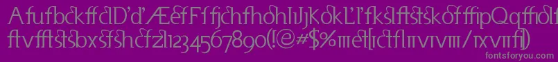 Useneta-fontti – harmaat kirjasimet violetilla taustalla