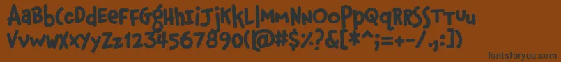 フォントPfphatfaceAlternate – 黒い文字が茶色の背景にあります