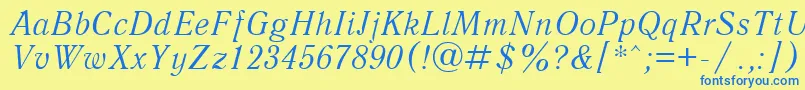 QuantantiquacttItalic Font – Blue Fonts on Yellow Background
