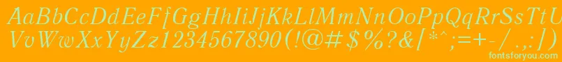 フォントQuantantiquacttItalic – オレンジの背景に緑のフォント