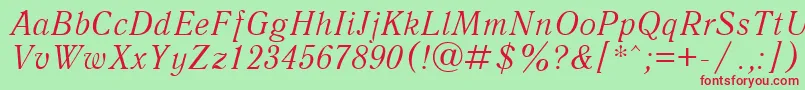 フォントQuantantiquacttItalic – 赤い文字の緑の背景
