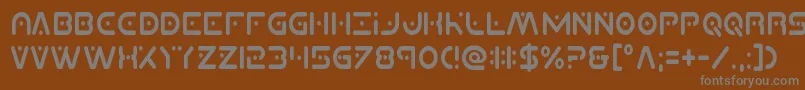 フォントPlanetxcompactcond – 茶色の背景に灰色の文字