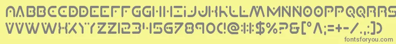 フォントPlanetxcompactcond – 黄色の背景に灰色の文字