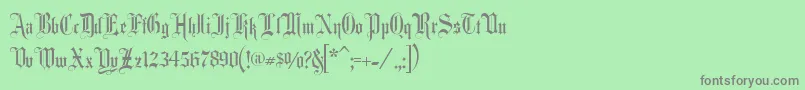 フォントFancy ffy – 緑の背景に灰色の文字