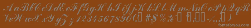 Laubergescriptssk-Schriftart – Graue Schriften auf braunem Hintergrund