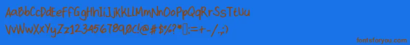 Kittype Font – Brown Fonts on Blue Background