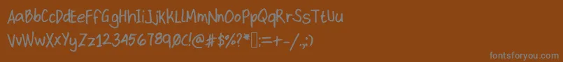 Kittype Font – Gray Fonts on Brown Background