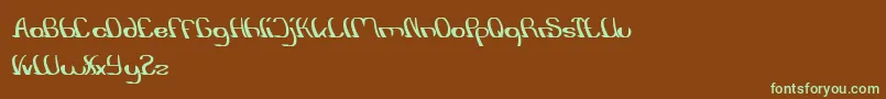 フォントSurfingAndPlay – 緑色の文字が茶色の背景にあります。