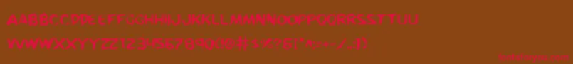 KreetureWarped Font – Red Fonts on Brown Background