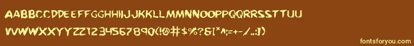 KreetureWarped Font – Yellow Fonts on Brown Background